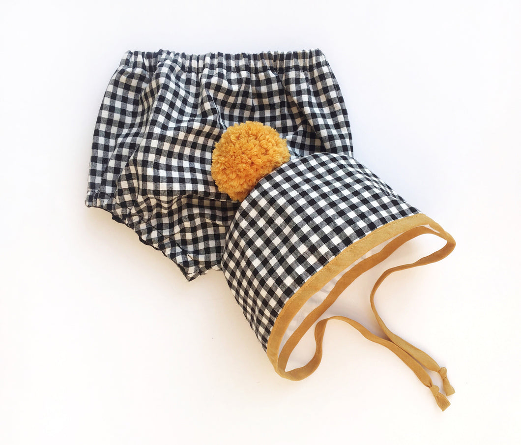 Black and White Gingham Winter Bonnet with Mustard Binding and matching Pom Pom